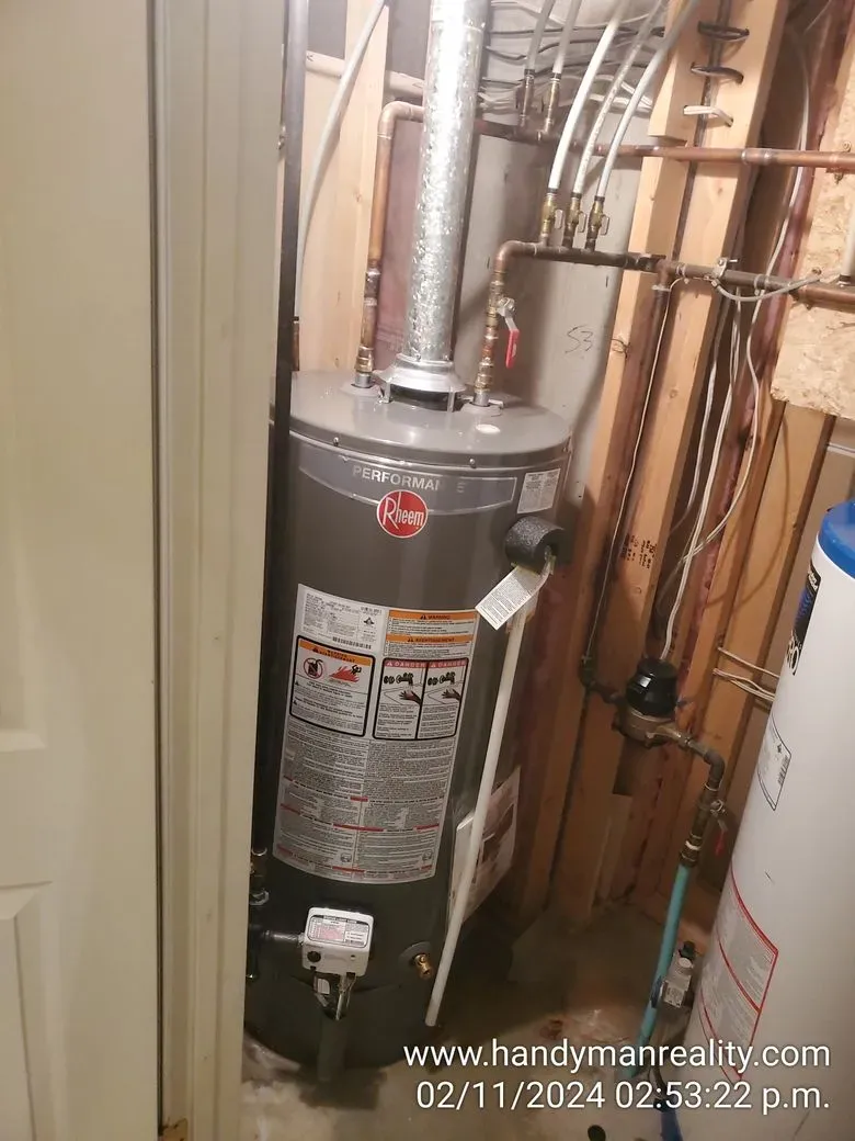 Gas water heater and venting in a basement mechanical room